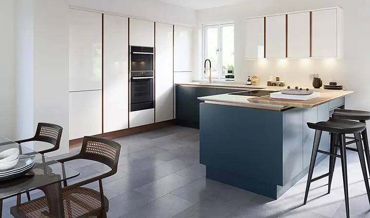 Gloss white and blue true handleless kitchen with copper hand rail.