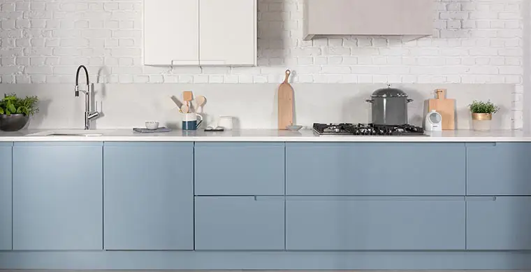 Light blue and white j handle kitchen.